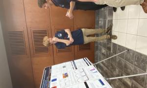 Poster Session:  Group shots of JANUS members viewing posters