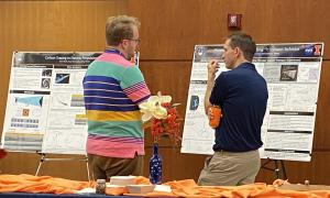 Poster Session:  Group shots of JANUS members viewing posters
