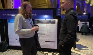 JANUS members at poster session.  Presenting and discussing posters. 