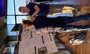 Poster Session:  Group shots of JANUS members viewing posters